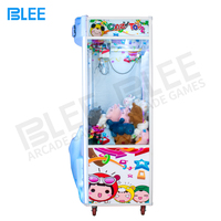 Machine de jeu de pêche aux peluches à succès avec un prix en forme de peluche, garantie 1 an, support anglais/espagnol, compatible 110V/220V