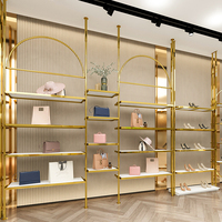 Porte-vêtements modulaire en acier inoxydable plaqué or PVD personnalisé pour boutique haut de gamme
