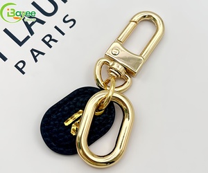 Zinc Alloy Die Casting Custom Oval-shaped <b>Leather</b> Golden Hollow Oval-shaped <b>Keychain</b> for Bag Car - Product Image 1