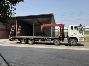 Heavy Duty HOWO NX 20 ton 25 ton lowbed <b>crane</b> truck with ramps and winch for construction and excavator - Product Image 5