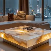 Italienischer Minimalismus Villa Wohnzimmer Couchtisch Leuchtender Jade-Marmor Edelstahlrahmen Hochwertige Leichte Wohnmöbel