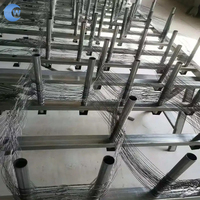 Fabrication en usine de filets de défense de haute qualité pour chars, filets de barrière pour chars, et grilles de interception pour chars.