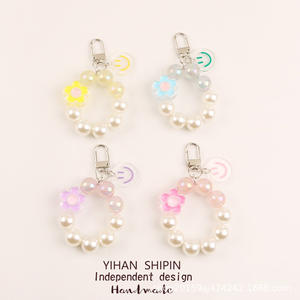 Nouveau visage fleur perle chaîne voiture porte-clés pendentif frais coloré Smiley accessoires étui pour écouteurs décoration - Product Image 1