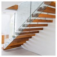 Escalier flottant pour projet d'appartement, balustrade en verre sur mesure, escaliers en cantilever