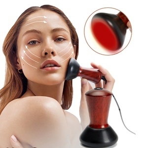 Masseur Gua Sha portable pour les yeux et le visage en pierre de Bian, masseur électrique en pierre naturelle chaude pour un lifting du visage en forme de V - Product Image 1