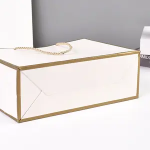 2024 חדש יצירתי ערבה שקיות נייר סיטונאי קופסאות מתנה מותאמות אישית ביגוד שקיות קראפט מתנה תת אריזה כף יד שקית נייר