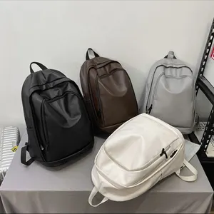 Mochila de ocio de PU con logotipo personalizado, mochila impermeable de fácil limpieza, mochila de estudiante de diseño simple unisex para uso diario