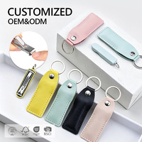 Ensemble de coupe-ongles pliables portables en acier inoxydable avec étui en cuir, porte-clés, taille voyage, outil de manucure, logo personnalisé OEM ODM