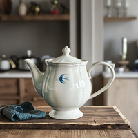 Service de table en céramique peint à la main, motif hirondelle en relief sous glaçure, design moderne et simple, comprenant bol, assiette, bouilloire, tasse à café haut de gamme
