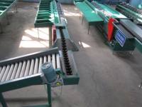Automatische fruit sorteermachine voor kiwi, mango en drakenvrucht, inclusief weegfunctie.