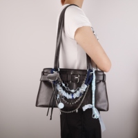 Breloque de sac à chaîne métallique double couche tendance avec ornements, accessoire décoratif pour sacs à main et bagages