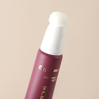 Tête de brosse floquée pour rouge à lèvres cosmétiques avec logo personnalisé Tubes de brillant à lèvres orange vides avec applicateur de flocage