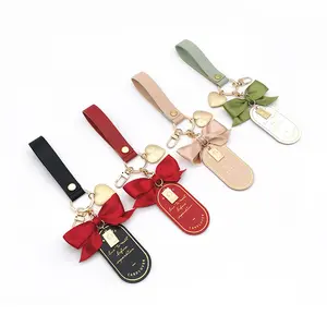 עור מכונית פאב מחזיק מפתחות מתכת צורת לב קשת סימנייה קשת סימנייה נשים ילדה תיק תרמיל תיק תליון קסם מתנה עסקית