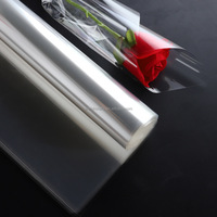 Vente en gros de rouleaux de cellophane transparents et transparents film rétractable de protection en plastique et papier PE pour emballage de cadeaux et de fleurs