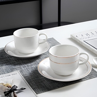 Ensemble moderne de tasses et soucoupes à café en porcelaine blanche solide, portable, pour la maison, le petit-déjeuner, le thé de l'après-midi, les hôtels, option de logo personnalisé