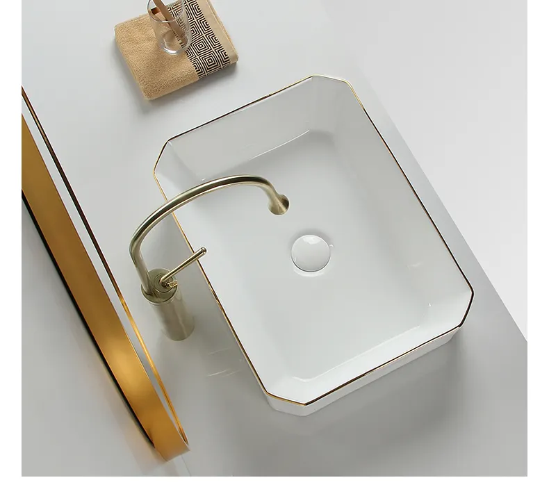 Lavabo Rectangular de cerámica con borde dorado para baño, lavabo de Arte Moderno blanco real con lavabo de mano de forma ovalada de estilo europeo