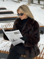 Manteau d'hiver élégant pour femme en fausse fourrure avec col à revers et manches longues