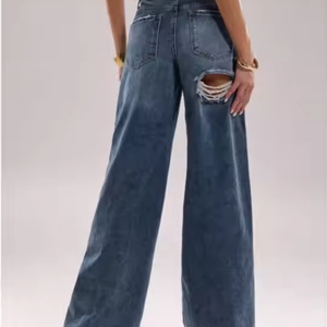 กางเกงยีนส์ขาบานเอวสูงสำหรับผู้หญิง สไตล์ลำลองสำหรับฤดูร้อน แต่งขาดดีไซน์เก๋ กระเป๋าแต่งรอยฉีก ลายเรียบๆ ทรงขากว้าง - Product Image 4