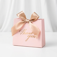 Boîte en papier rose pour chocolats, idéale pour les cadeaux de mariage et les fêtes, fabriquée par des fournisseurs chinois de Yiwu pour petites entreprises.
