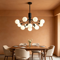 Lustre LED suspendu moderne et créatif en fer noir avec boule de verre, idéal pour villa et salon, style luxe