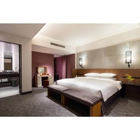 Meubles de chambre à coucher modernes et personnalisables en métal Ac International : Tables de chevet, bancs de rangement pour hôtels 5 étoiles et appartements