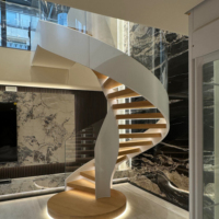 Escalier en colimaçon moderne en acier inoxydable avec rampe en verre pour appartement, escalier intérieur courbé durable au design antique