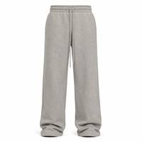 Pantalon de jogging pour homme en molleton de coton gris, jacquard texturé, coupe ample et décontractée, taille mi-haute, style sportif