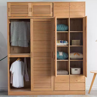 Armoire de chambre moderne en panneaux de particules avec portes battantes à persiennes, durable et écologique, pour villa et salon domestique
