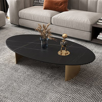 Table basse ovale moderne minimaliste de luxe léger avec plateau en ardoise et structure métallique pour salon et usage domestique