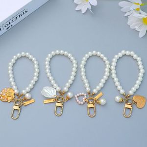 พวงกุญแจลูกปัดมุกน่ารักพวงกุญแจห้อยข้อมือปรับแต่งได้ - Product Image 1