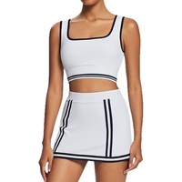 Nouvelle jupe de sport unie anti-exposition avec coussinets de poitrine intégrés pour le tennis, la course, le fitness et le yoga, ensemble de vêtements de tennis en polyester et élasthanne, collection Printemps