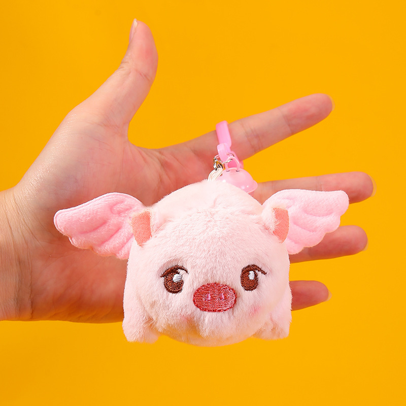 ตุ๊กตาหมูบินเล็กตาโตสีชมพู [พวงกุญแจ]