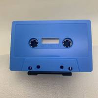 Boîtier de cassette vierge en plastique ABS à coque solide, avec fenêtre d'affichage et logo personnalisé, pour la création de mixtapes DIY et l'enregistrement.