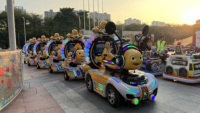 Tren Eléctrico sin Rieles para Niños, Modelo Nailong Escort, con Capacidad para 10 Pasajeros, para Niños, Adultos y Padres, con Juegos en Pantalla Gratuitos