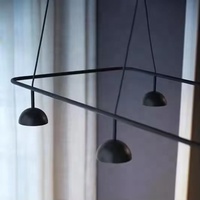Lustre LED suspendu de haute qualité pour salle à manger d'hôtel, design artistique, minimaliste, créatif, en métal noir