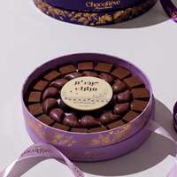Boîtes cadeaux d'emballage de luxe estampage à chaud circulaire client fleur fraise truffe Chocotale