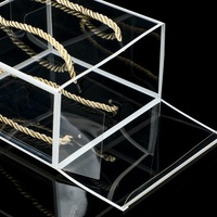 Fabricants chinois CSMD, vente en gros de boîtes d'emballage cadeau en plastique transparent en PET à prix avantageux avec poignée torsadée dorée
