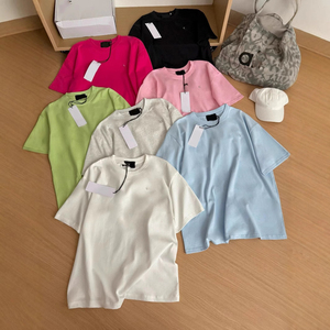 T-shirt casual da donna a maniche corte in cotone tinta unita con logo argento, vestibilità ampia, versione corretta, collezione Estate 2026 - Product Image 1