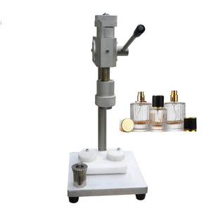 Máquina de prensado Máquina de cierre de sellado de aerosol de perfume de vidrio Máquina de tapado de botellas de perfume de plástico de vidrio de escritorio - Product Image 1