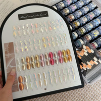 Ensemble de 48 poudres magiques effet miroir 2026 – Nouvelle collection Aurora Fantasy, poudre lueur de lune haute brillance pour salons de manucure (vente en gros)