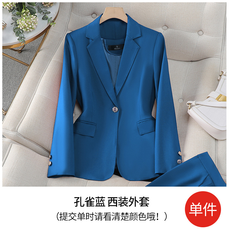 Peacock blue suit
