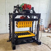 Machine à fabriquer des blocs de ciment QT4-40, machine à briques de pavage solides, manuelle et mobile, vente directe d'usine pour petites entreprises, fourniture de matériaux de construction