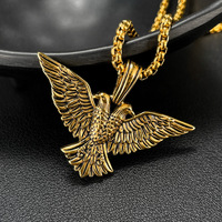 Colliers pendentifs en acier inoxydable tendance hip-hop punk créatif à double tête d'aigle religieux pour hommes en gros