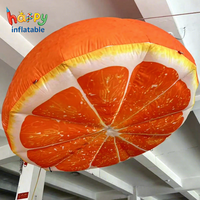 Modèle de tranche d'orange géante gonflable, ballon publicitaire personnalisé en forme de fruit des agrumes pour la promotion de bars à jus et les événements.