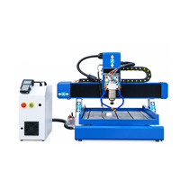 Machine de gravure CNC Jinan Mosencnc 6060 pour la fabrication de panneaux et logos en bois