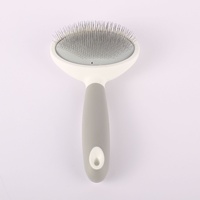 Produits pour animaux de compagnie tendance 2026 : Brosse lissante en fil d'acier inoxydable pour chiens et chats, outil de toilettage rembourré auto-nettoyant