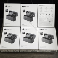 DJI Mic Mini (2 Émetteurs + 1 Récepteur + Boîtier de Charge) Microphone Sans Fil avec 48 Heures d'Autonomie pour Enregistrement Audio DJI Mic Mini