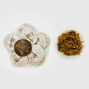 Il tè Mini Pu'Er Xigui (tè crudo) di grado speciale ha un Aroma unico e una consistenza liscia della zuppa. Viene utilizzato In alberghi e conferenze. - Product Image 1