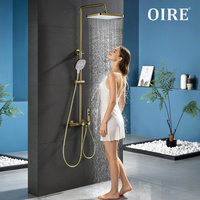 Ensemble de douche thermostatique de luxe Oire en laiton, finition or brossé, système de douche à effet pluie doux apparent avec barre coulissante, idéal pour l'hôtellerie
