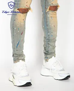 Ripped Jeans Made In China Edge Denim Custom Skinny Jeans Trousers Ripped Distressed Western Vintage Blue Paint Splash Splatters Denim Jeans China Factory